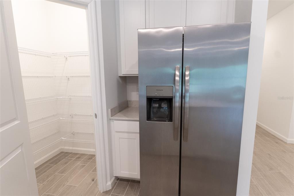 4501 Northwest 14th Loop Ocala, FL 34482 - Photo 23 of 38 a bathroom with a glass shower door