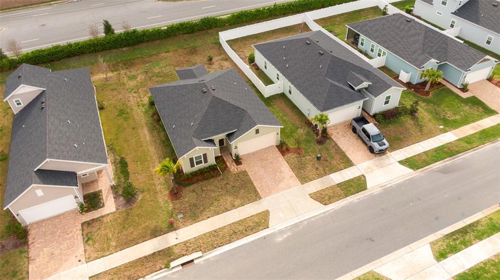 4501 Northwest 14th Loop Ocala, FL 34482 - Photo 34 of 38 an aerial view of residential houses with outdoor space