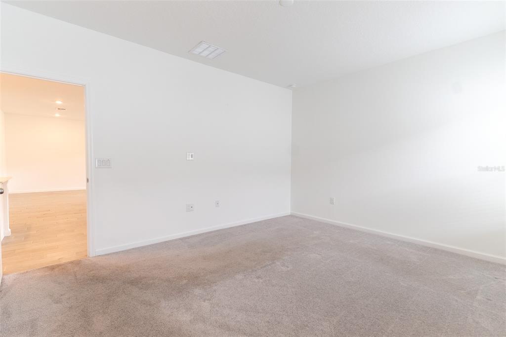 4501 Northwest 14th Loop Ocala, FL 34482 - Photo 4 of 38 a view of an empty room