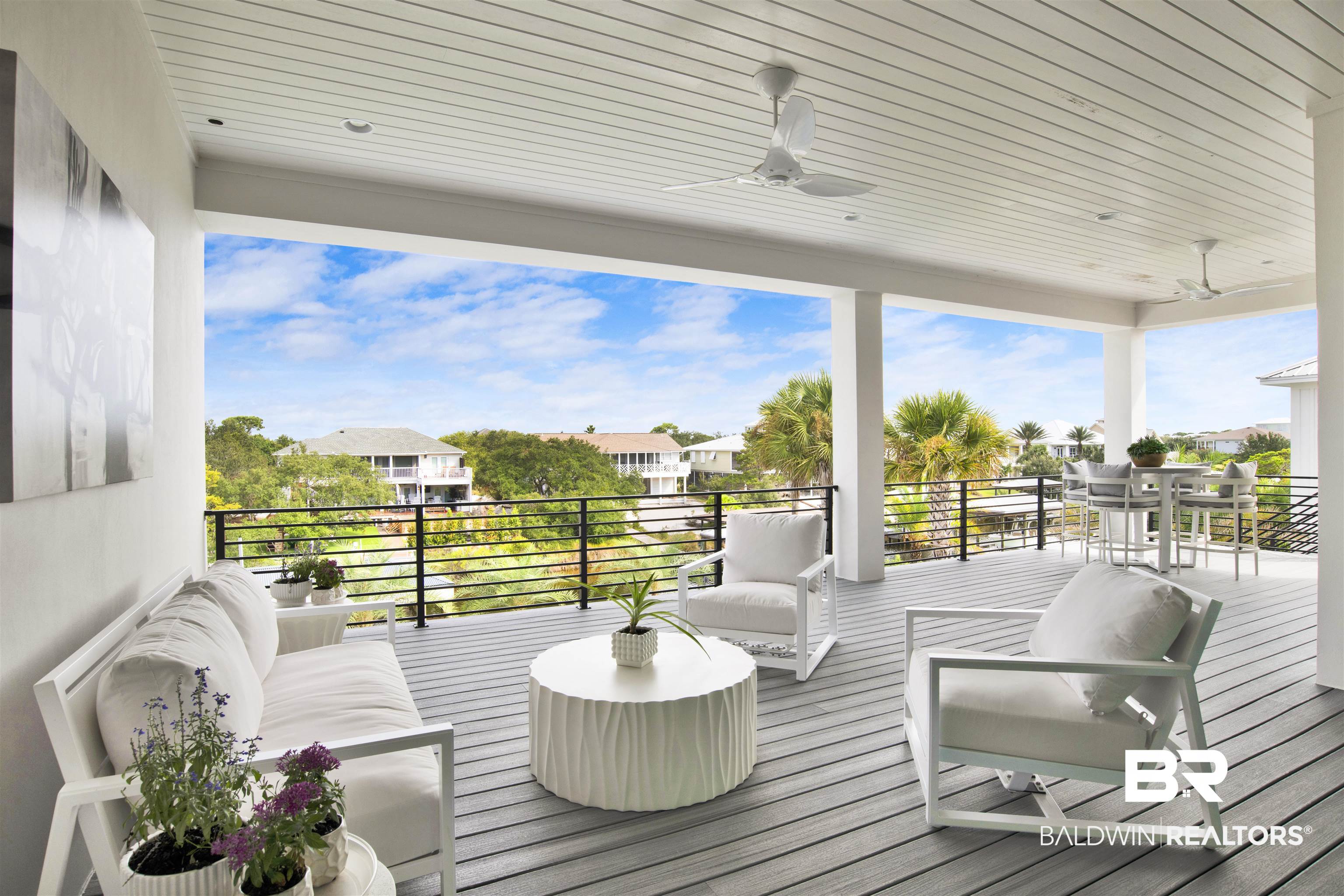 30239 Canal Court Orange Beach, AL 36561 - Photo 28 of 70 Wooden deck featuring a ceiling fan, a patio area, a residential view, and an outdoor living space