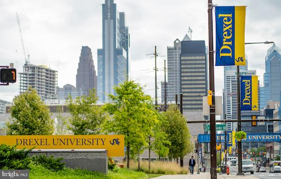 623 North 32nd Street, Unit 2 Philadelphia, PA 19104 - Photo 1 of 12 a view of a city with tall buildings
