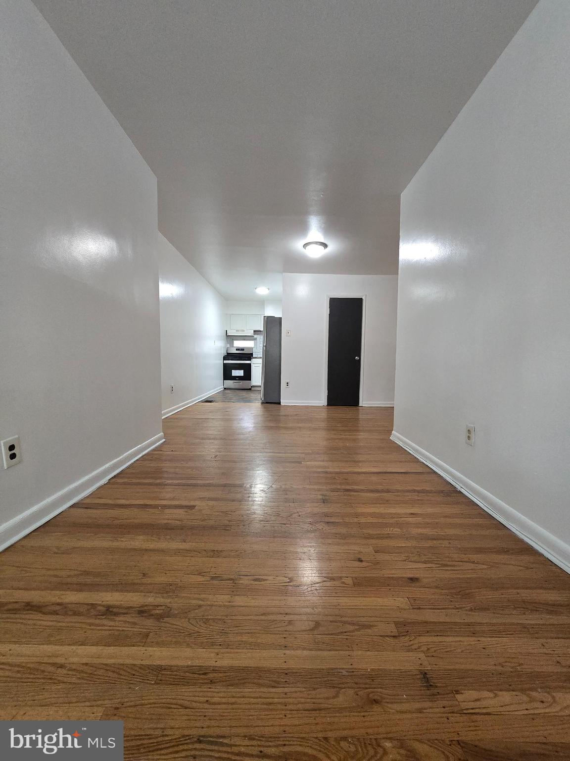 623 North 32nd Street, Unit 2 Philadelphia, PA 19104 - Photo 6 of 12 a view of a room with wooden floor