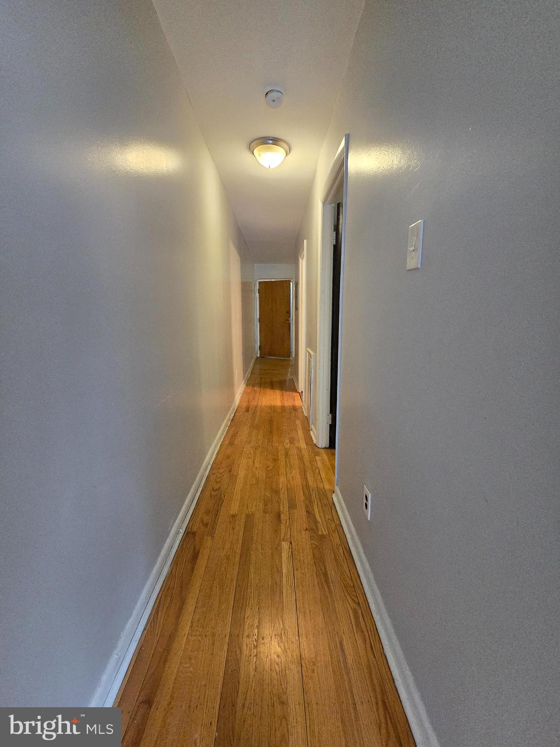 623 North 32nd Street, Unit 2 Philadelphia, PA 19104 - Photo 10 of 12 a view of a hallway with wooden floor