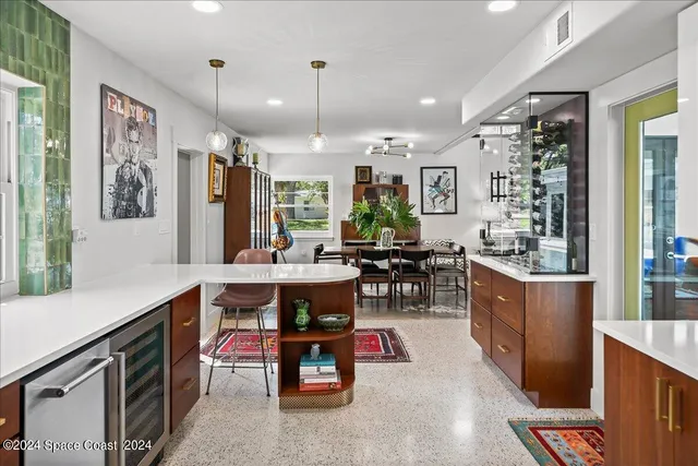 a kitchen with stainless steel appliances refrigerator and cabinets