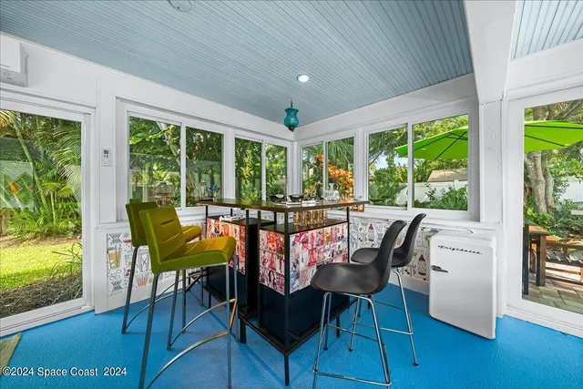 a potted plant sitting in front of a door