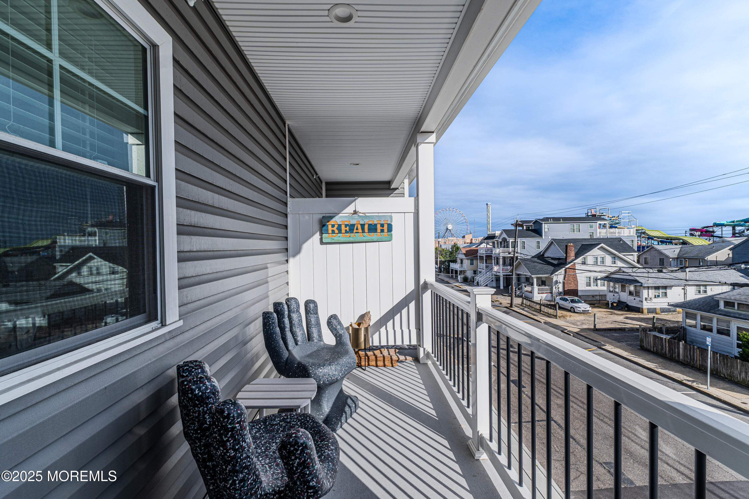 64 Sheridan Avenue, Unit B Seaside Heights, NJ 08751 - Photo 11 of 20 a view of a balcony with chairs