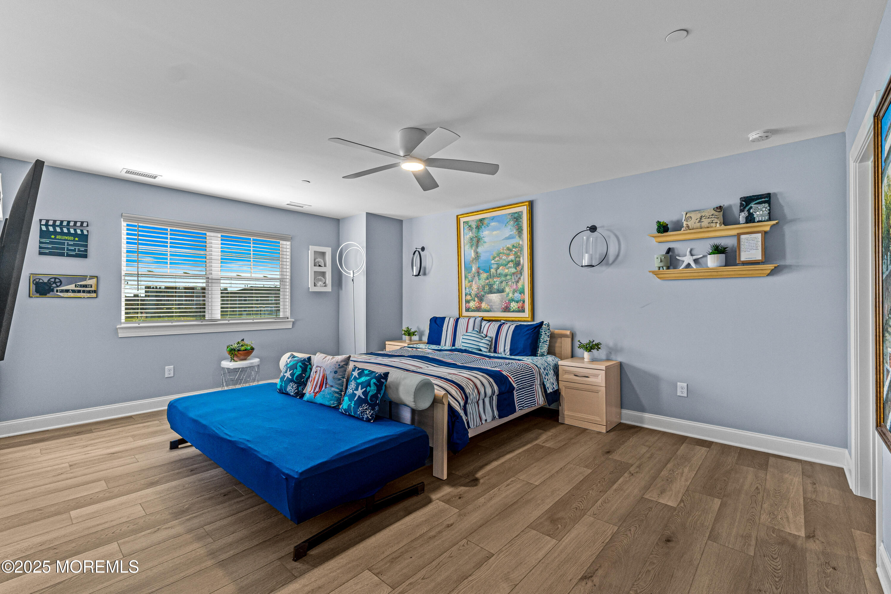 64 Sheridan Avenue, Unit B Seaside Heights, NJ 08751 - Photo 17 of 20 a bedroom with a bed and wooden floor