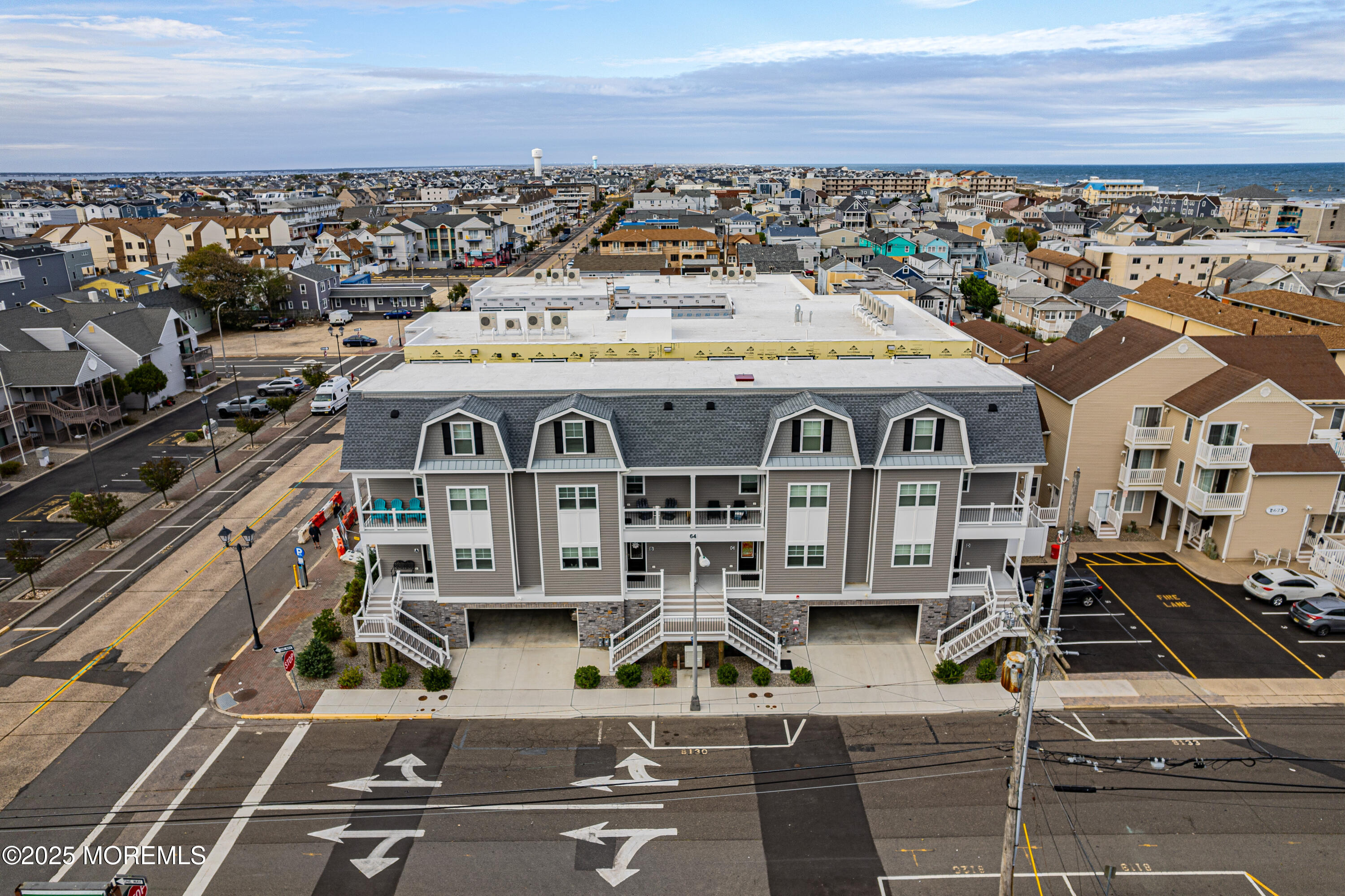 64 Sheridan Avenue, Unit B Seaside Heights, NJ 08751 - Photo 2 of 20 a view of a city with tall buildings