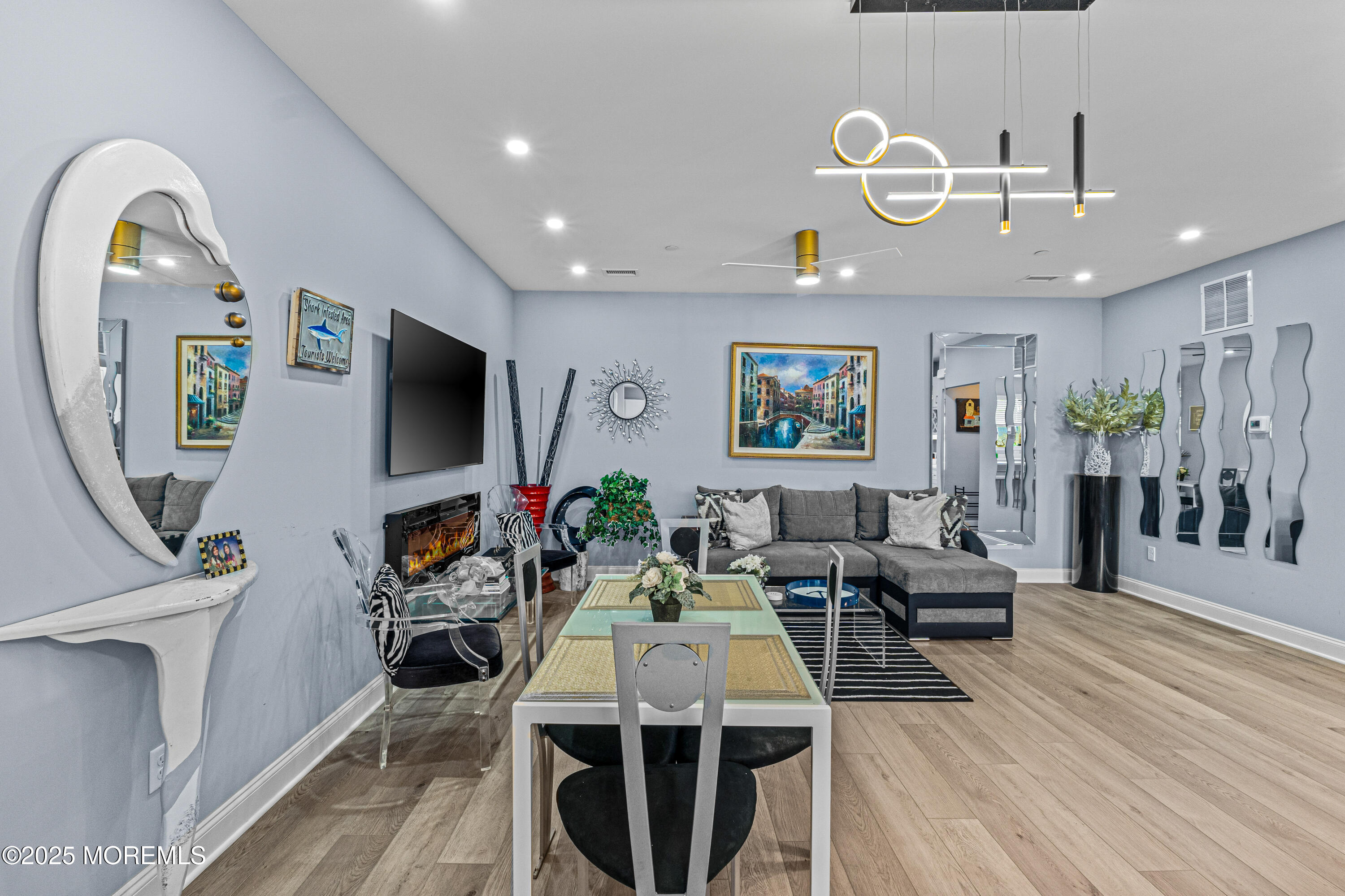 64 Sheridan Avenue, Unit B Seaside Heights, NJ 08751 - Photo 5 of 20 a living room with furniture and a flat screen tv