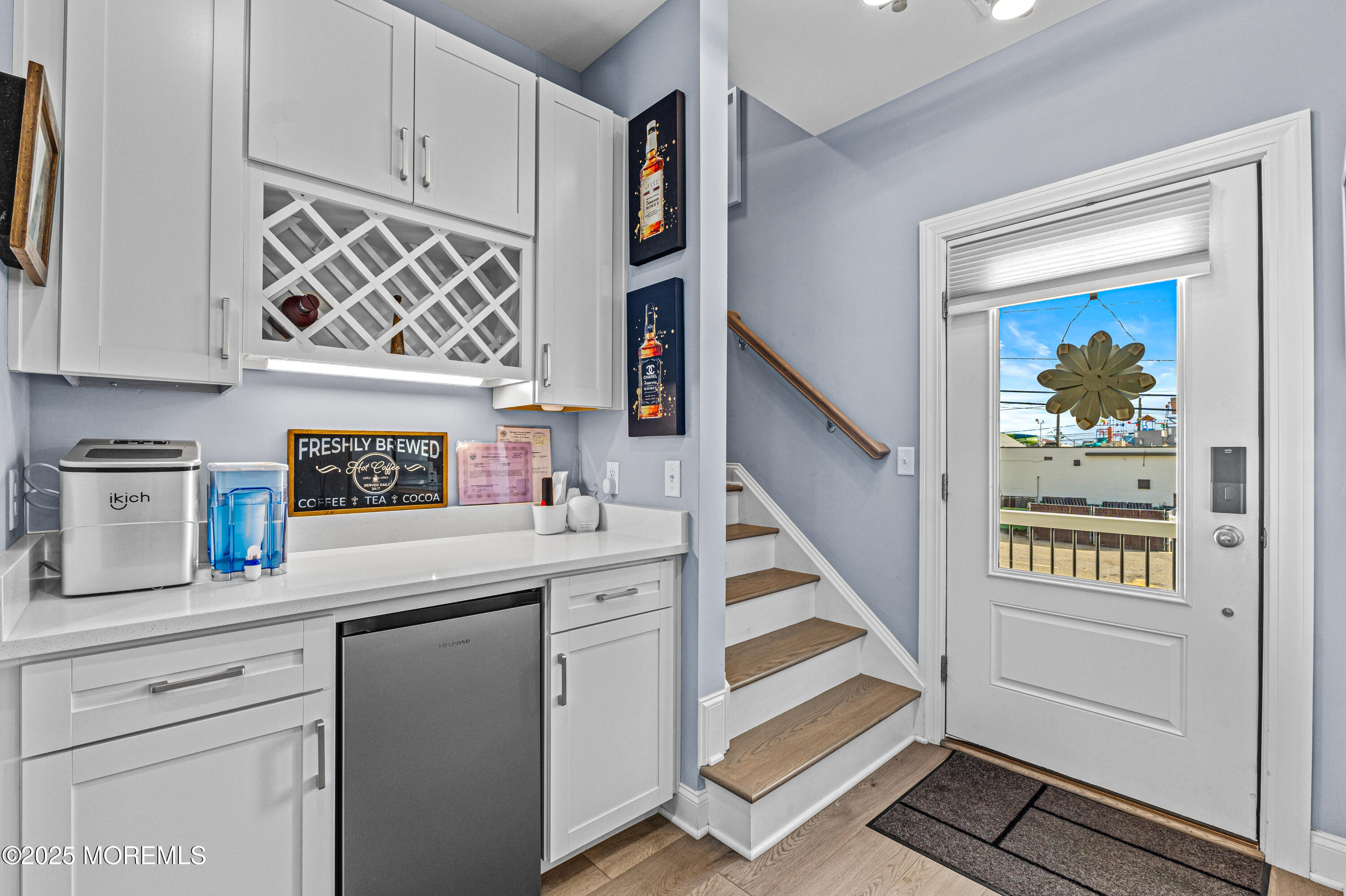 64 Sheridan Avenue, Unit B Seaside Heights, NJ 08751 - Photo 7 of 20 a kitchen with stainless steel appliances granite countertop a sink and a stove next to a window
