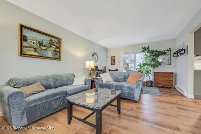 a bathroom with a sink a mirror and a shower