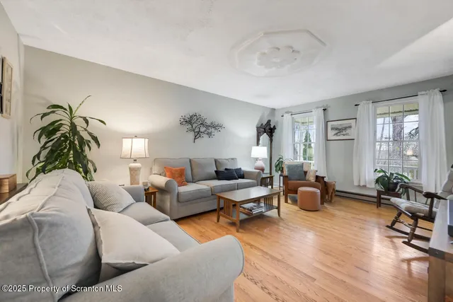 a bathroom with a sink and mirror with toilet