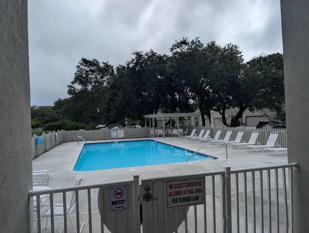 a view of a patio with swimming pool