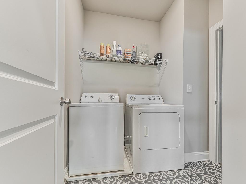 200 Lakeside Place Canton, GA 30114 - Photo 11 of 38 a utility room with dryer and washer
