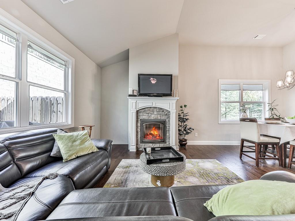 200 Lakeside Place Canton, GA 30114 - Photo 21 of 38 a living room with furniture fireplace and window