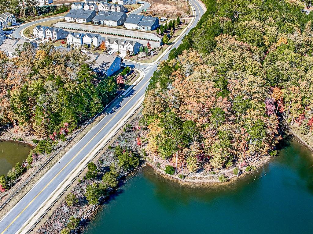 200 Lakeside Place Canton, GA 30114 - Photo 36 of 38 a view of a swimming pool with a outdoor seating