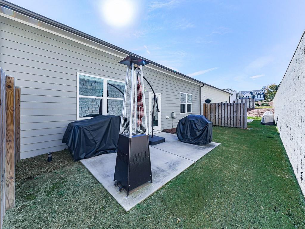 200 Lakeside Place Canton, GA 30114 - Photo 6 of 38 a view of a backyard with furniture