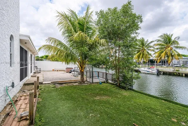 a house view with a garden space