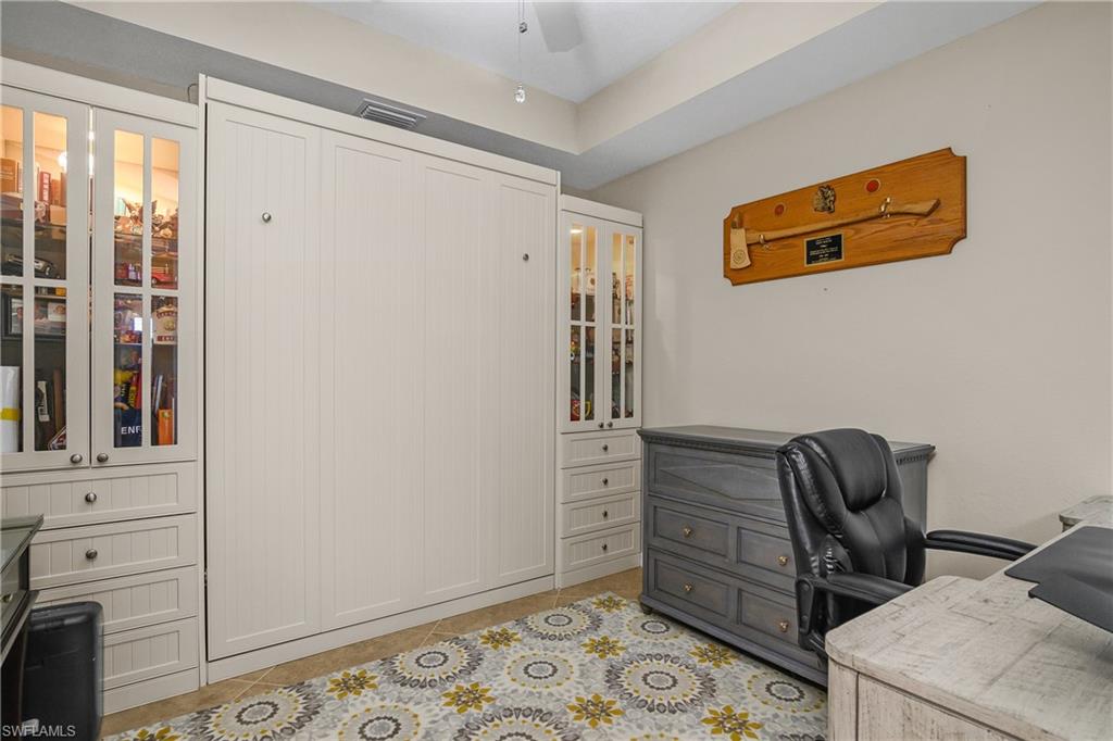 9513 Avellino Way, Unit 2014 Naples, FL 34113 - Photo 20 of 48 Murphy bed conveys with the home!