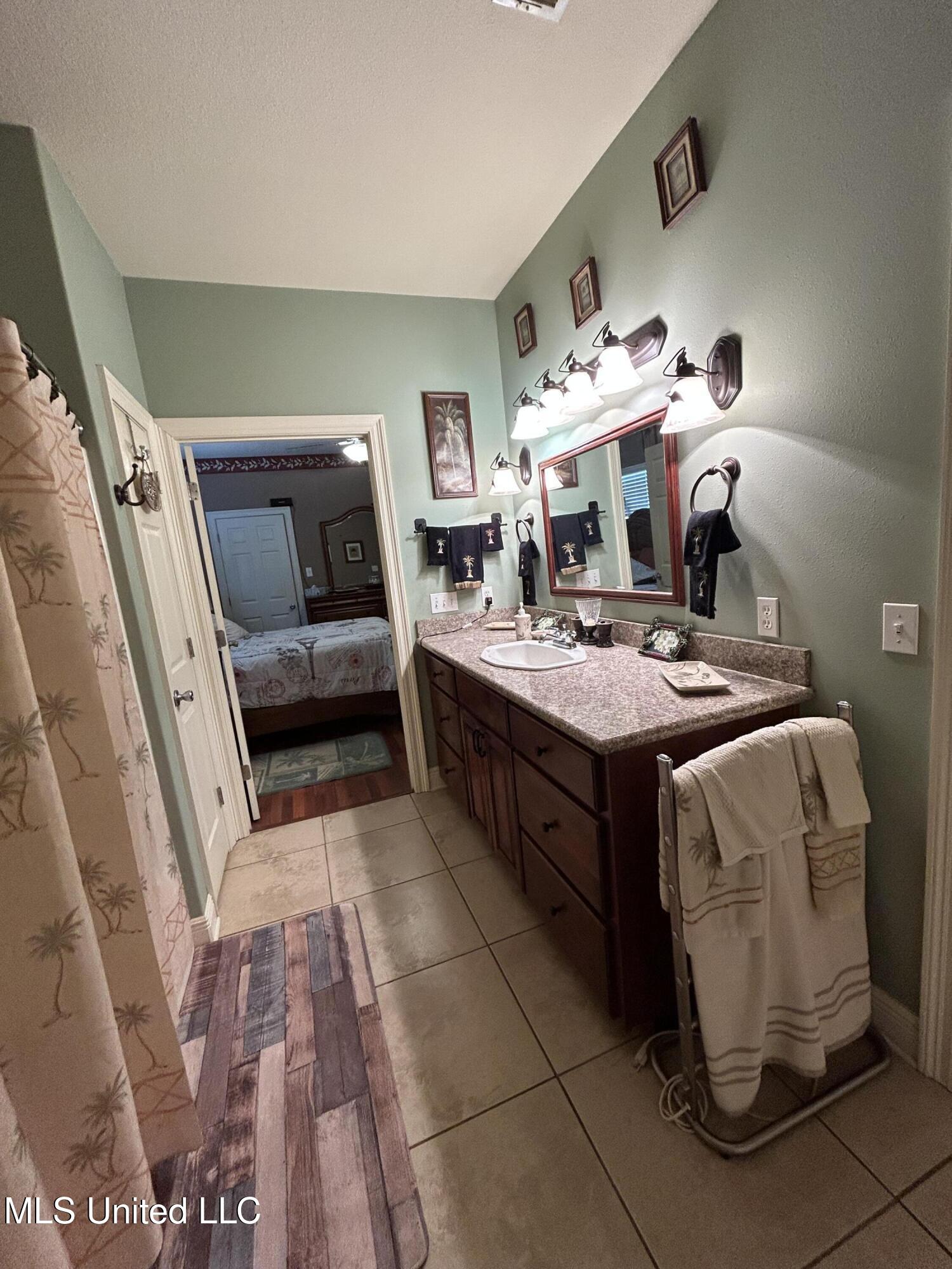 447 Russell Avenue Long Beach, MS 39560 - Photo 21 of 34 guest bath with entry to bedroom