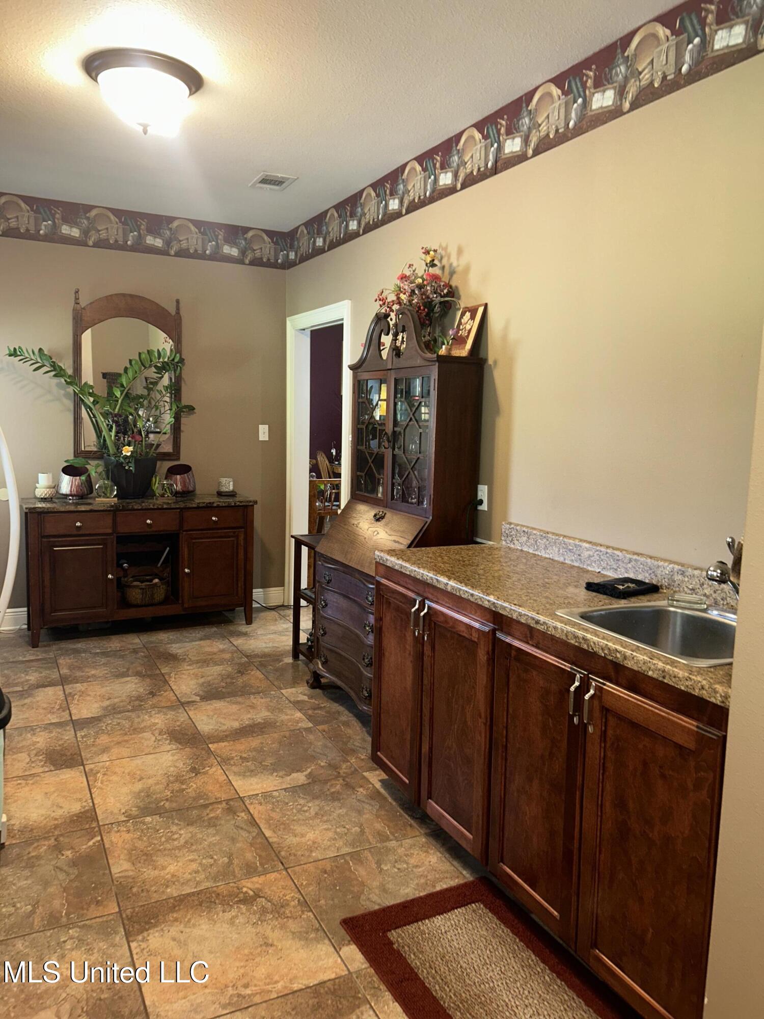 447 Russell Avenue Long Beach, MS 39560 - Photo 24 of 34 Laundry room sink