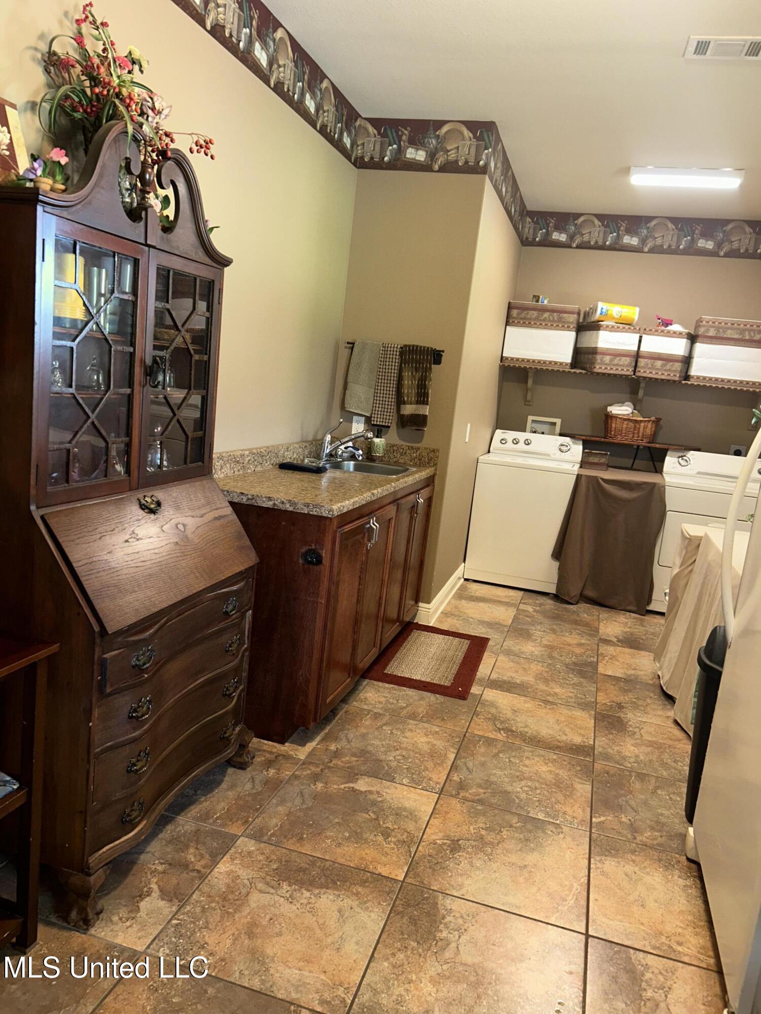447 Russell Avenue Long Beach, MS 39560 - Photo 25 of 34 laundry room 1