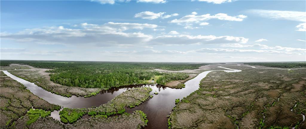 a view of a lake from a yard