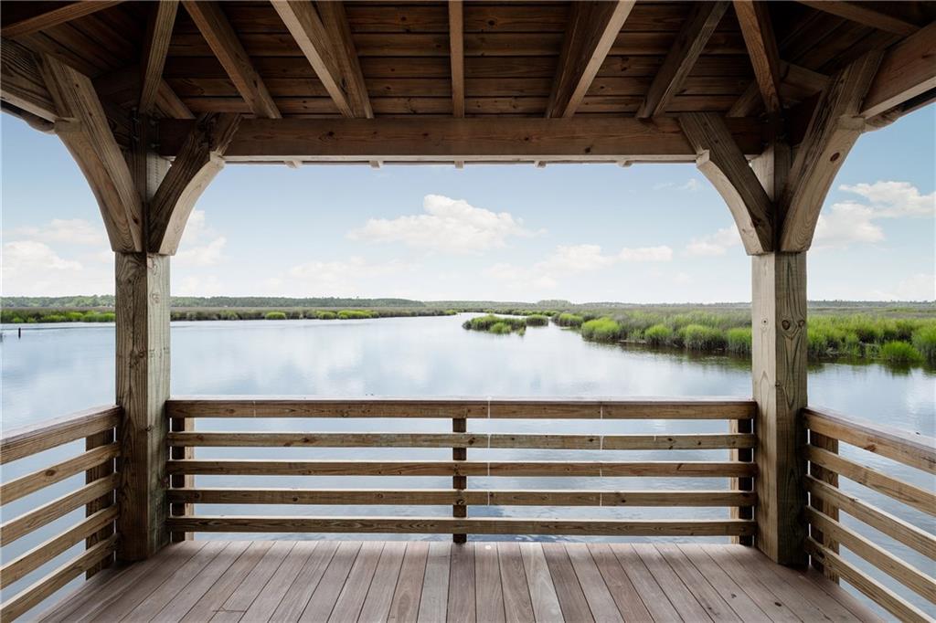 0 Iron Safe Road Brunswick, GA 31523 - Photo 26 of 26 a view of water heater room with wooden floor