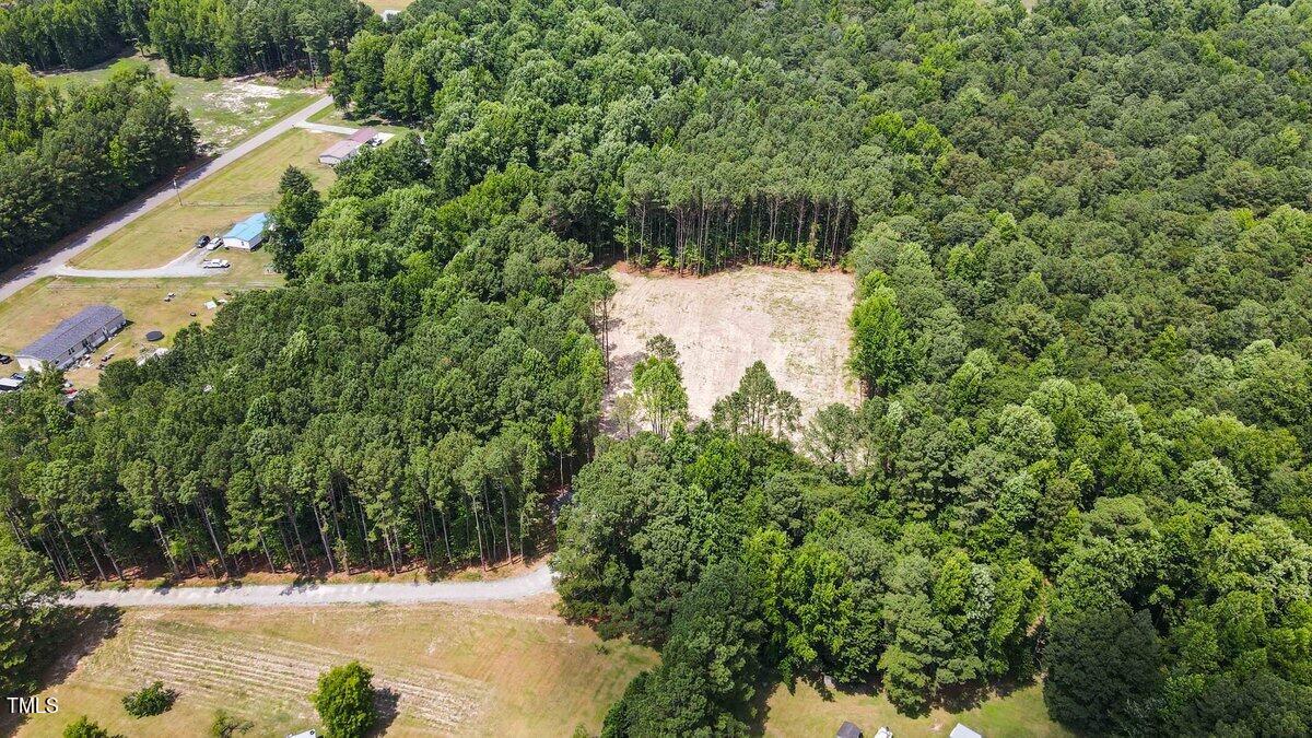 612 Fellowship Church Road Princeton, NC 27569 - Photo 3 of 7 a view of a yard with wooden fence