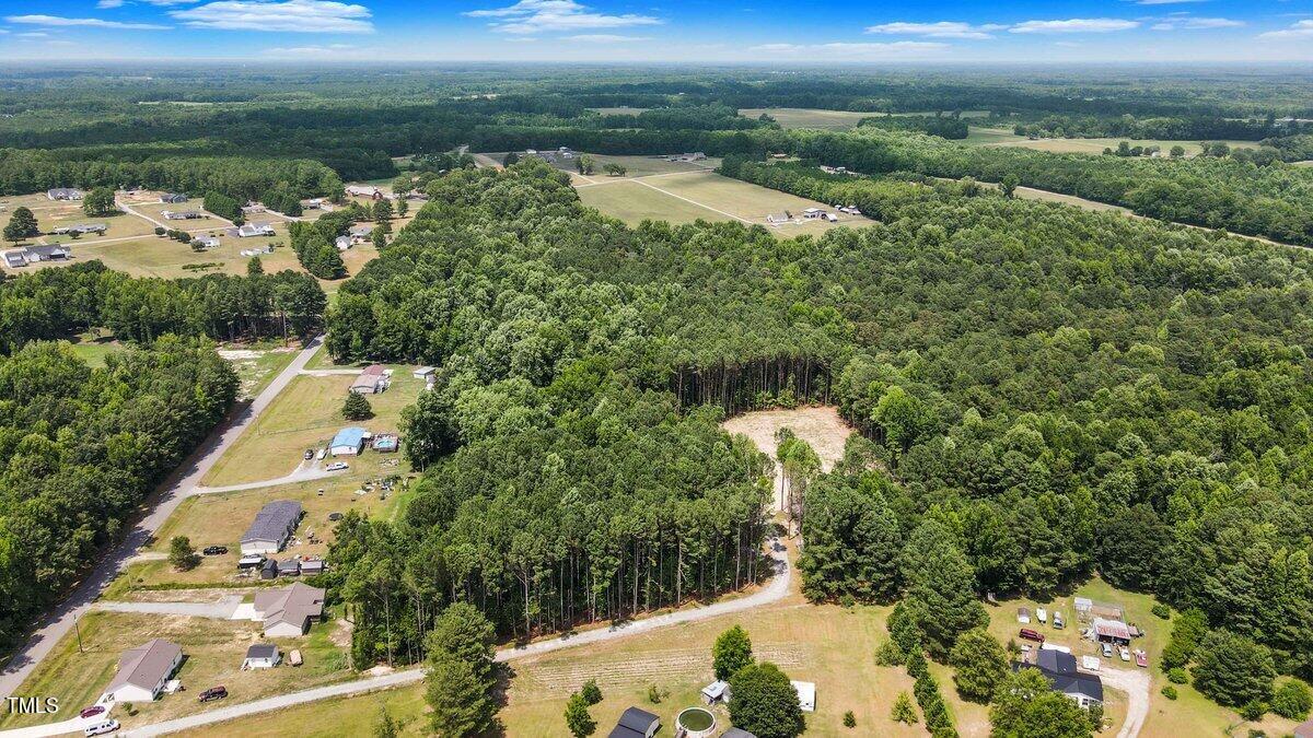 612 Fellowship Church Road Princeton, NC 27569 - Photo 5 of 7 a aerial view of a house with a yard and lake view