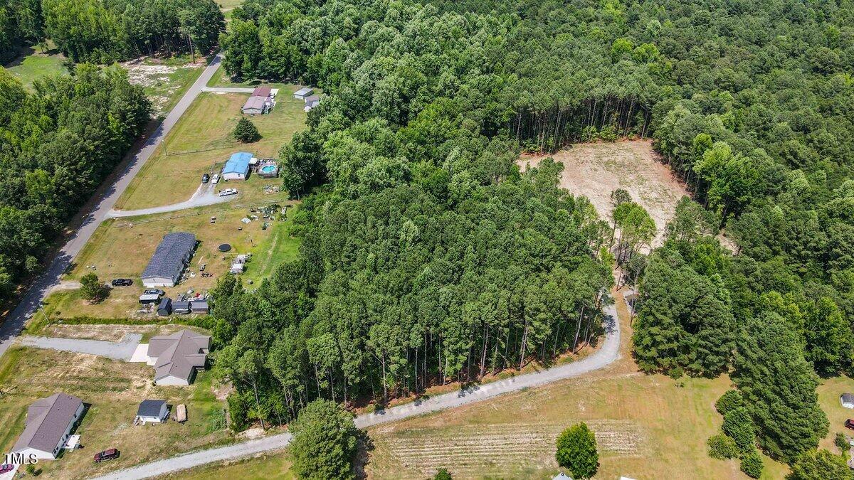 612 Fellowship Church Road Princeton, NC 27569 - Photo 7 of 7 an aerial view of a house with a yard and lake view