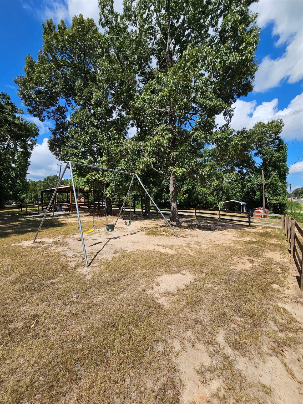 0 Roatan Drive Point Blank, TX 77364 - Photo 12 of 26 a view of a playground with basketball court