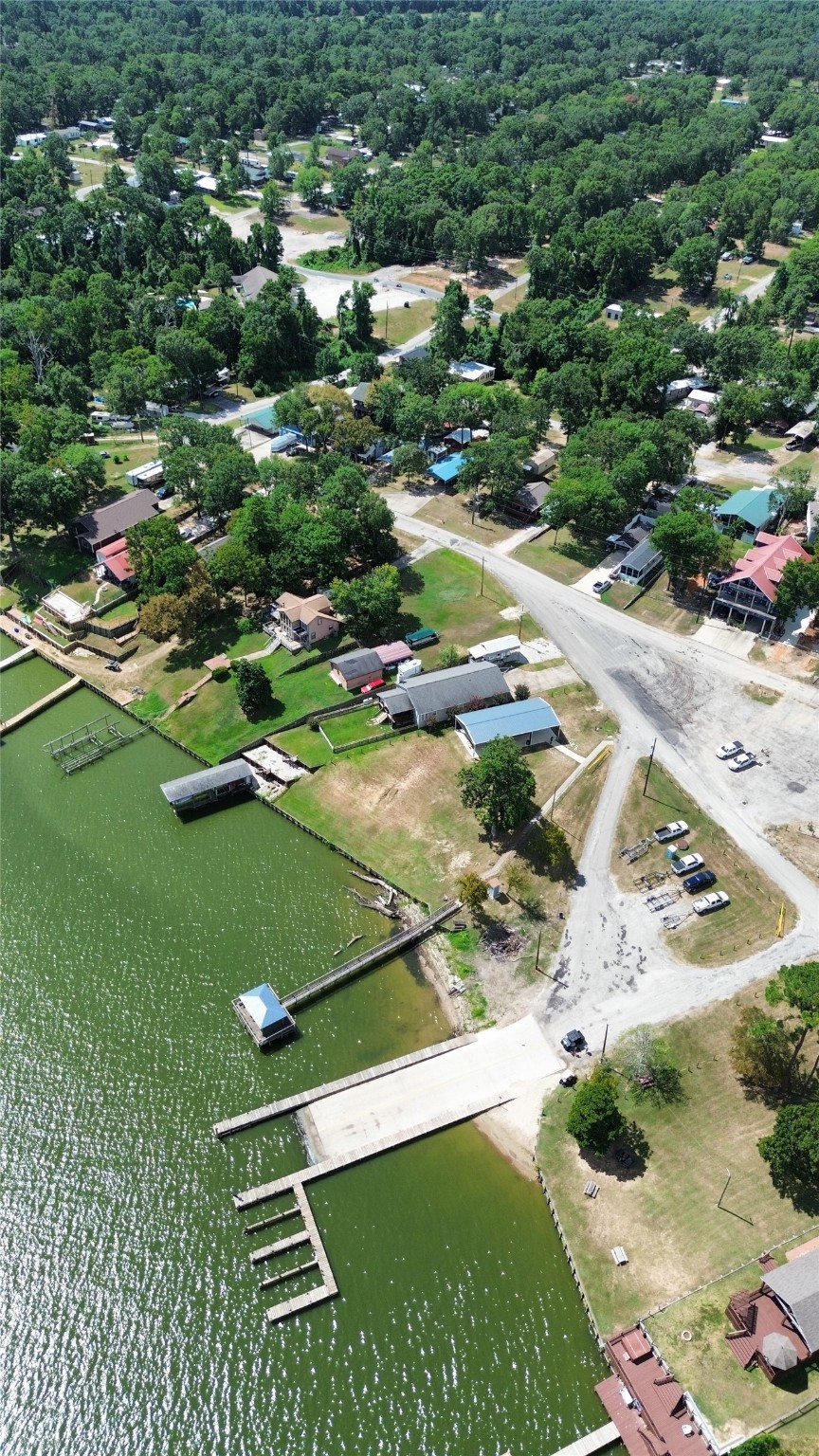 0 Roatan Drive Point Blank, TX 77364 - Photo 18 of 26 a view of a pool with a yard