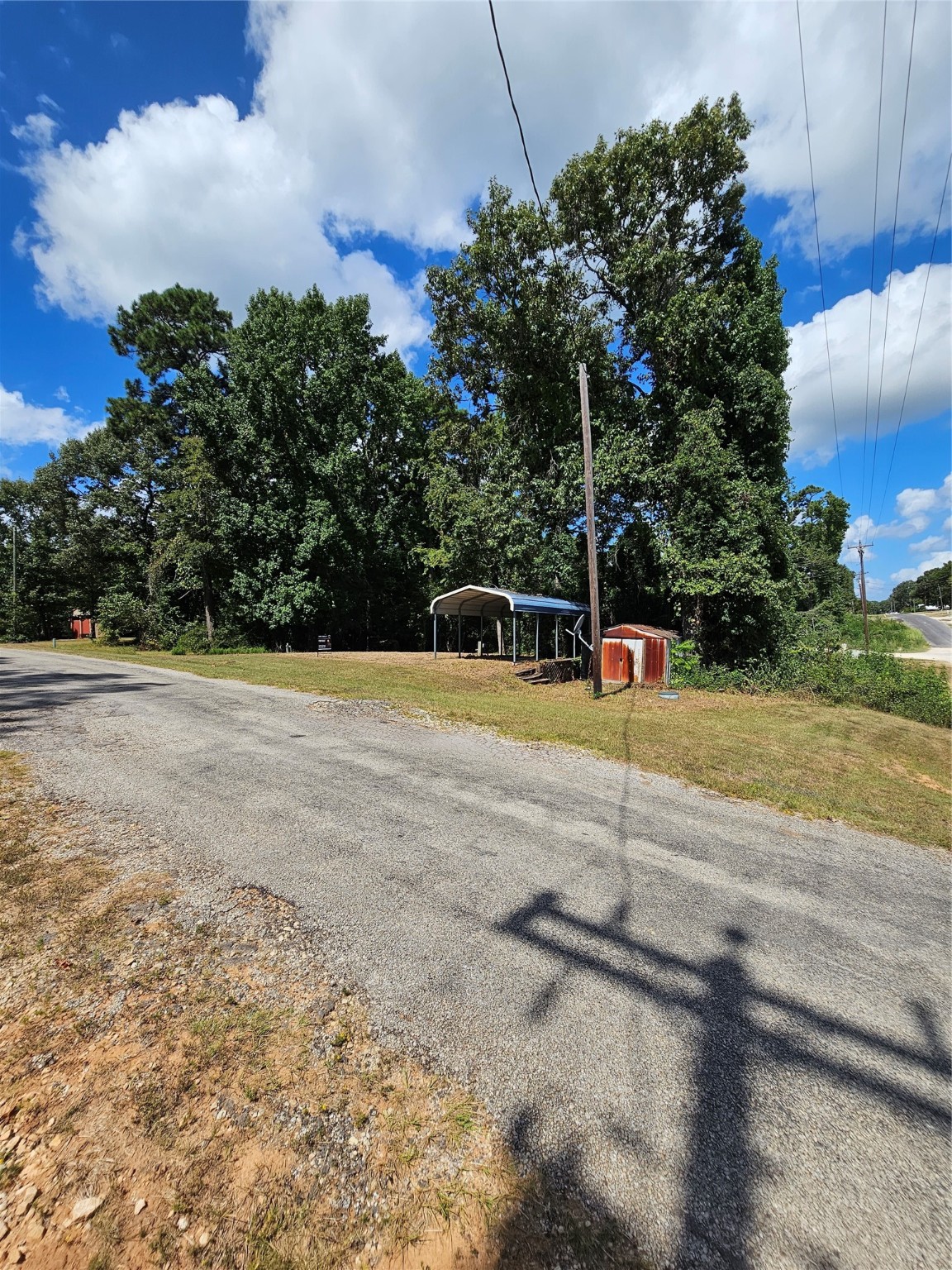 0 Roatan Drive Point Blank, TX 77364 - Photo 3 of 26 a view of a fountain with a yard