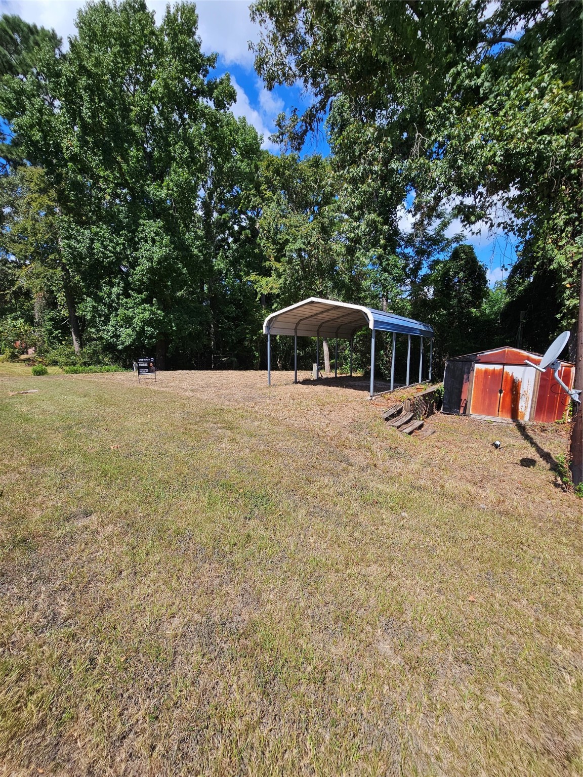 0 Roatan Drive Point Blank, TX 77364 - Photo 4 of 26 a view of a house with a yard