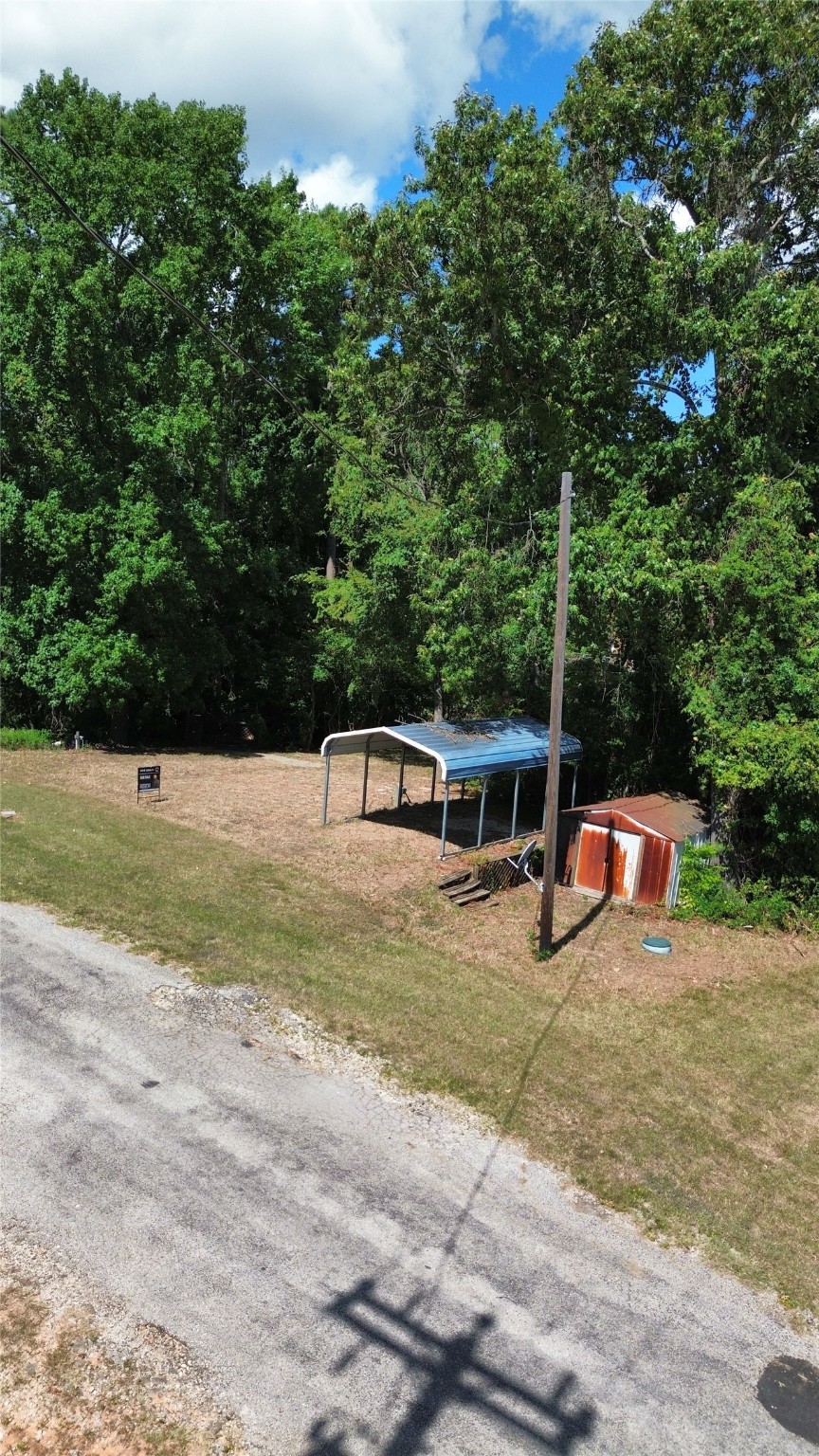 0 Roatan Drive Point Blank, TX 77364 - Photo 7 of 26 a view of a outdoor space