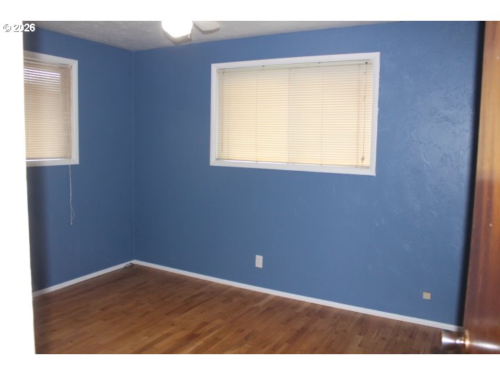 21620 Glaze Road Veneta, OR 97487 - Photo 10 of 36 a view of an empty room with a window
