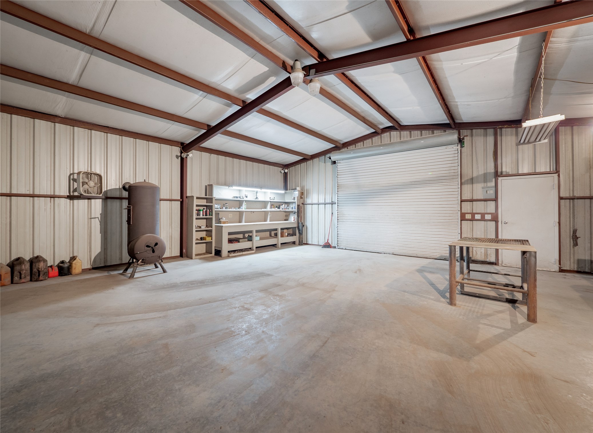 1350 County Road 414 Hamilton, TX 76531 - Photo 26 of 40 a view of empty room with wooden walls