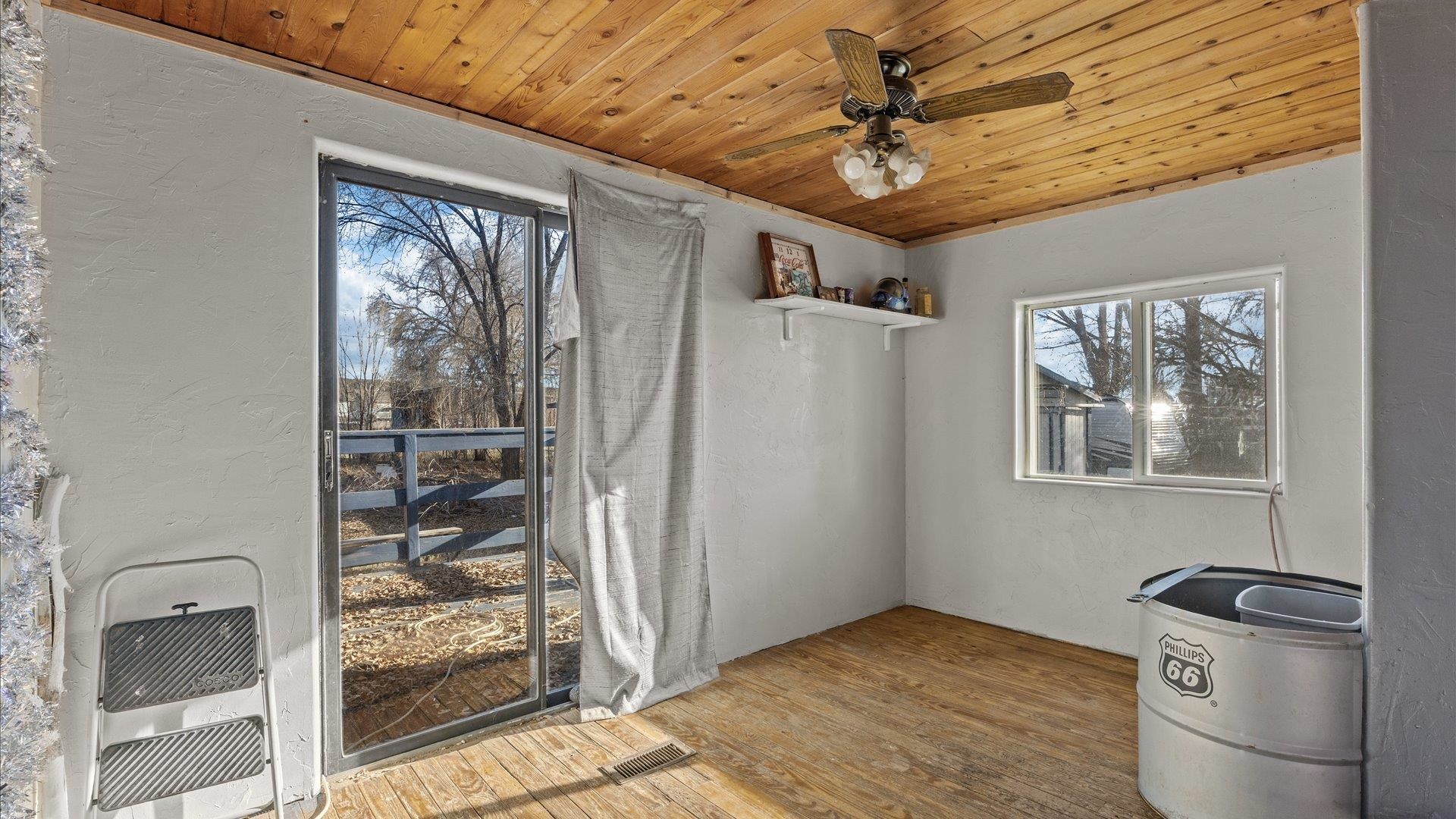 180 1/2 Southwest 8th Avenue Cedaredge, CO 81413 - Photo 15 of 18 a view of a hallway with windows