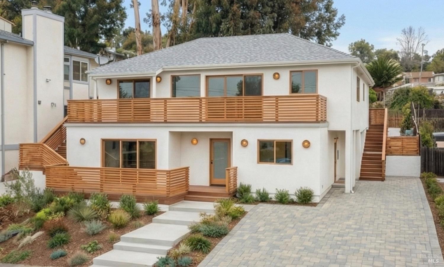 14670 Midland Road Castro Valley, CA 94578 - Photo 1 of 30 a front view of a house with a yard and garage