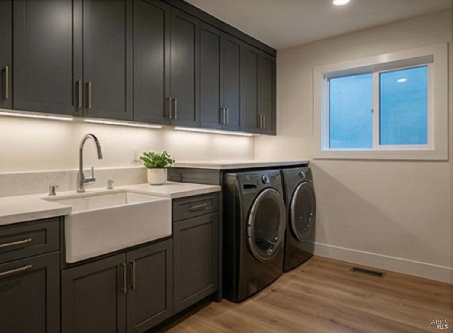 14670 Midland Road Castro Valley, CA 94578 - Photo 15 of 30 a utility room with sink dryer and washer