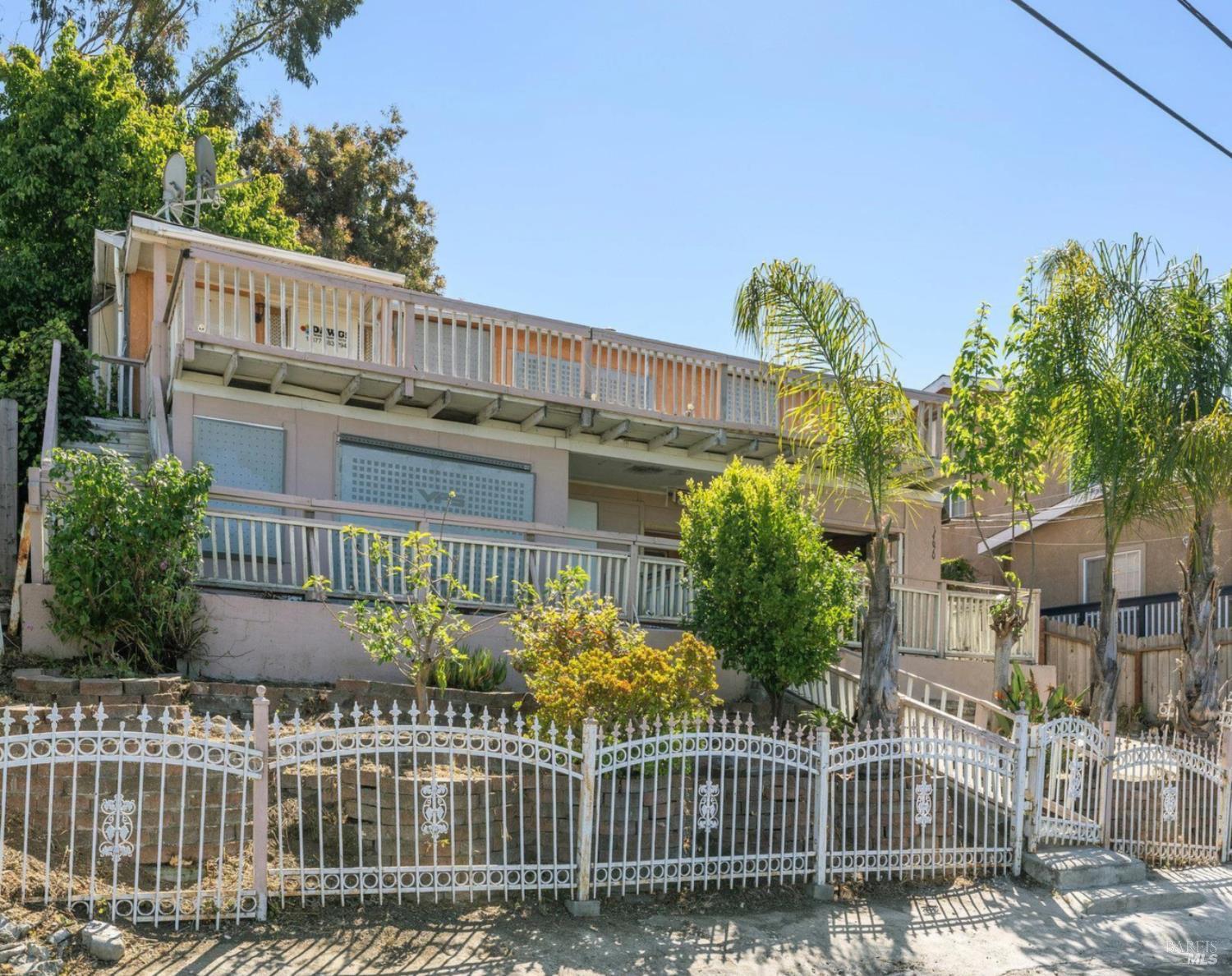 14670 Midland Road Castro Valley, CA 94578 - Photo 2 of 30 a view of a house with a small yard and wooden fence