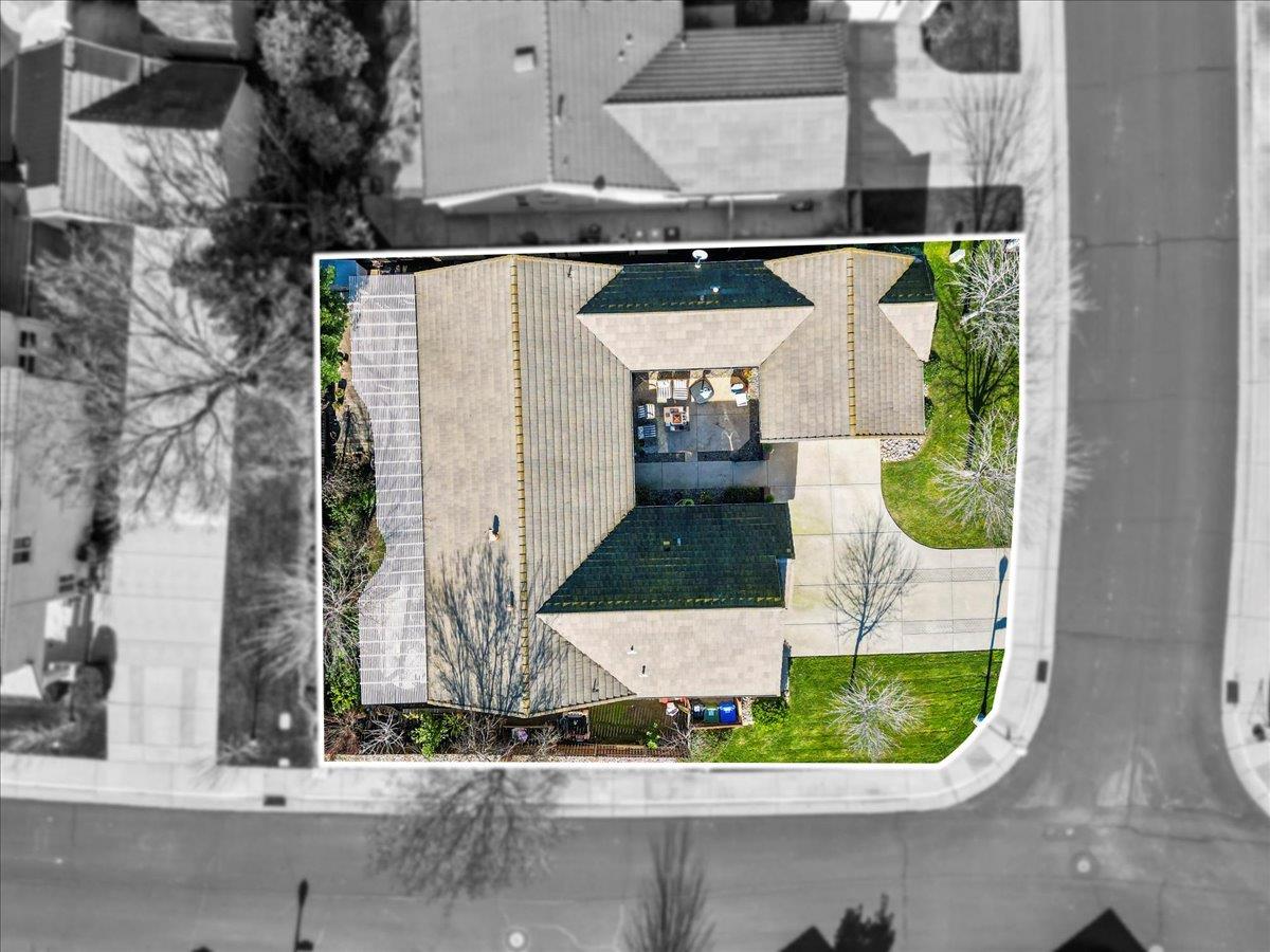 9168 Sipler Way Elk Grove, CA 95758 - Photo 31 of 35 an aerial view of a house with a yard and potted plants