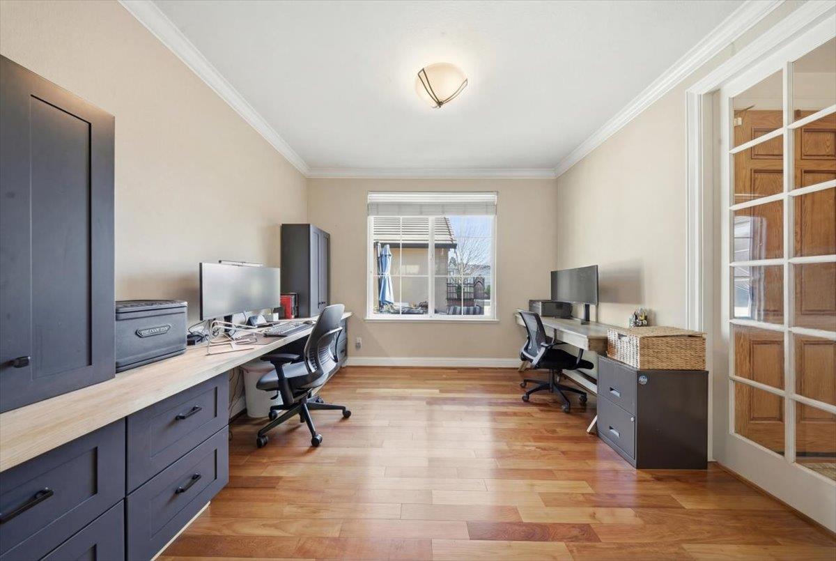 9168 Sipler Way Elk Grove, CA 95758 - Photo 9 of 35 a view of a workspace with furniture and windows