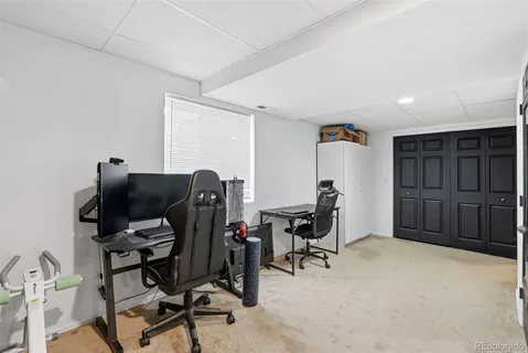 a view of a workspace with furniture