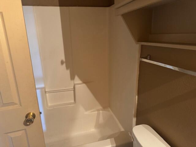 817 Ute Avenue Lubbock, TX 79403 - Photo 16 of 17 a bathroom with a sink and toilet