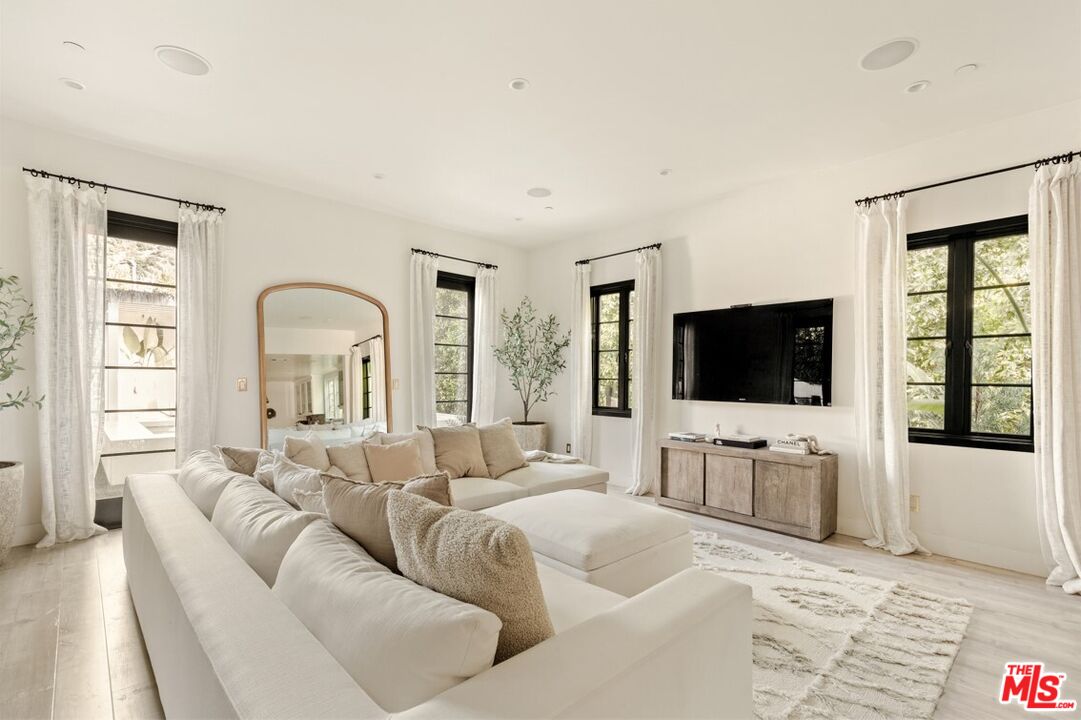 1436 Ethel Street Glendale, CA 91207 - Photo 17 of 47 a living room with furniture and a flat screen tv