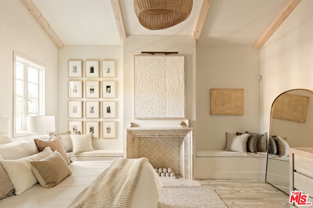 1436 Ethel Street Glendale, CA 91207 - Photo 26 of 47 a bedroom with a bed a couch and a window