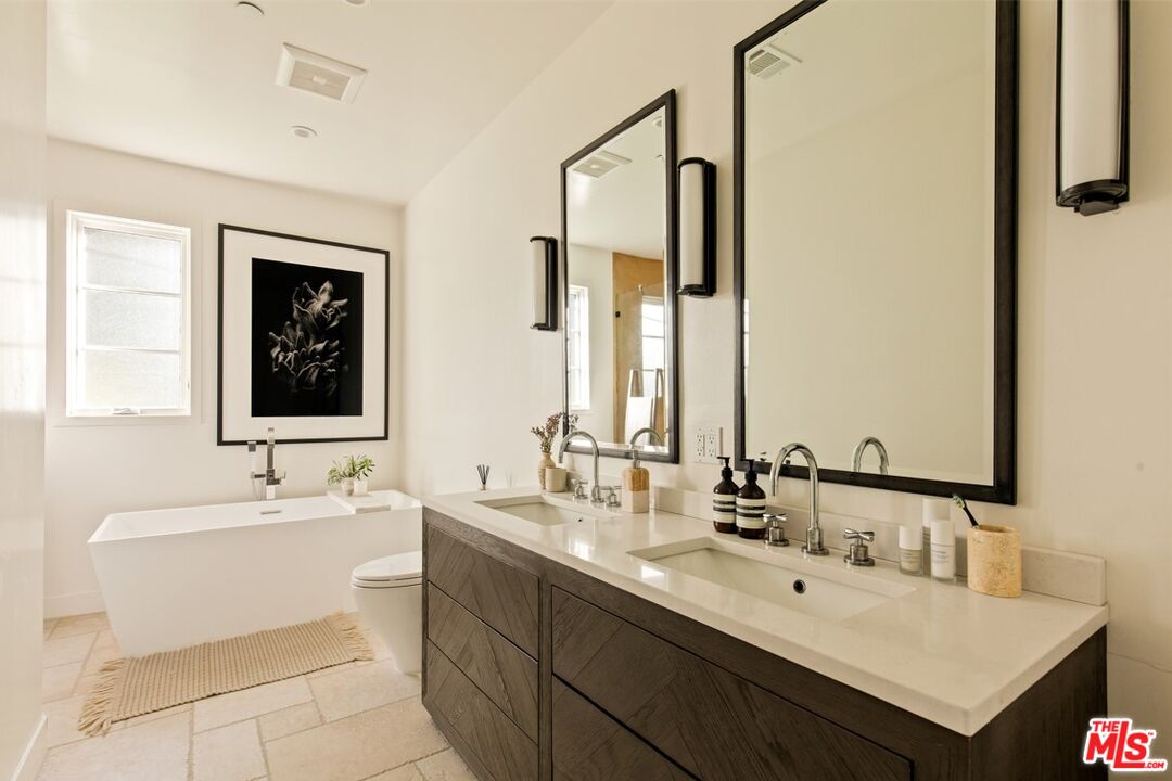 1436 Ethel Street Glendale, CA 91207 - Photo 30 of 47 a bathroom with a double vanity sink mirror and