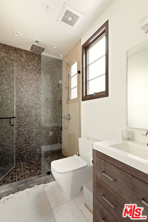 1436 Ethel Street Glendale, CA 91207 - Photo 39 of 47 a bathroom with a sink a toilet and shower